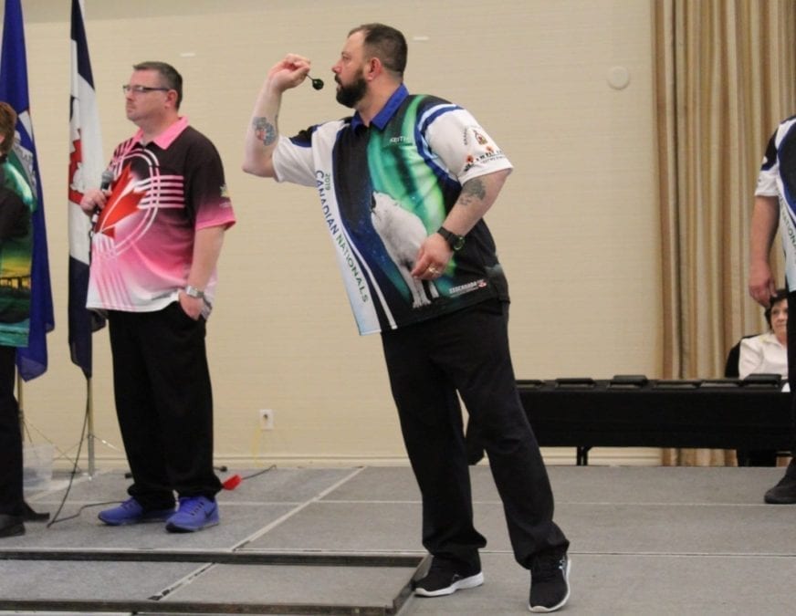 Keith Way, seen during the men's doubles final of the Adult National Darts Championships in Saskatoon on Tuesday, has qualified for the World Masters darts tournament happening later this year in England. photo courtesy of Keith Bourque