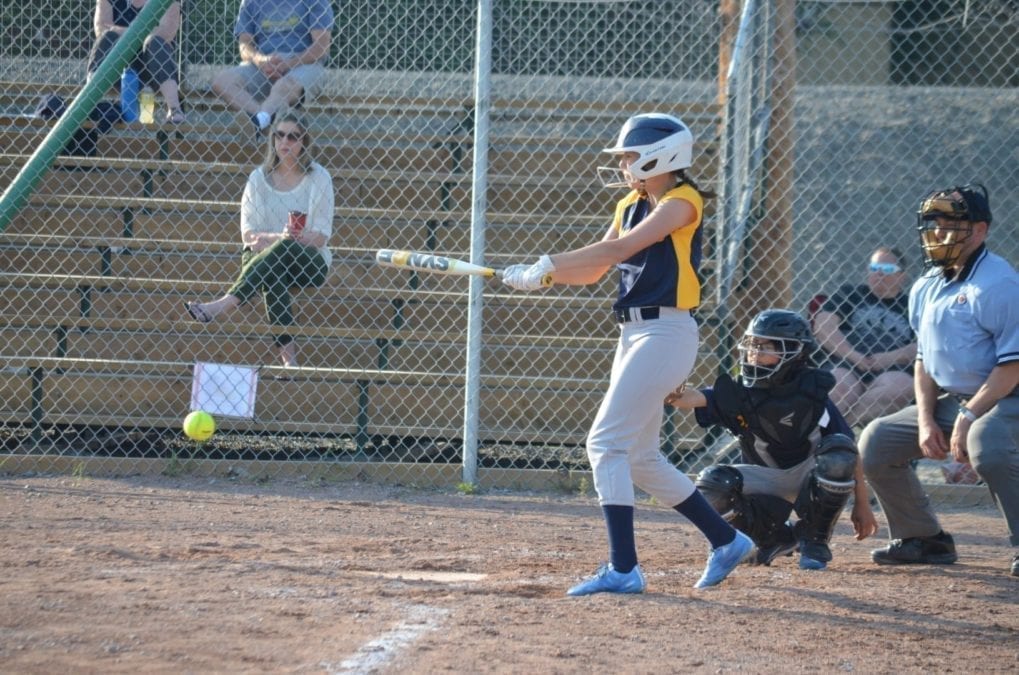 Alanna Pellerin puts the ball into play during the minor ball portion of Family Day at the Ballpark at Tommy Forrest Ball Park on June 19. James McCarthy/窪蹋勛圖厙 photo