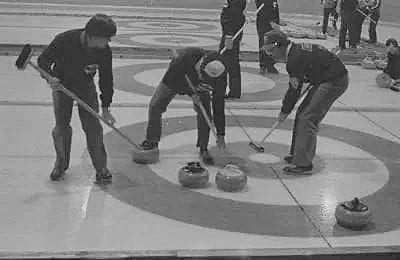 Randy Waddell, left, Don Sian and Doug Bothamley watch their rock head into the rings during the 1983 Elks Corby Cup bonspiel at the Yk Community Arena. The trio, along with skip Klaus Schoenne, would go on to win the championship and claim Yellowknife's very first national curling title.