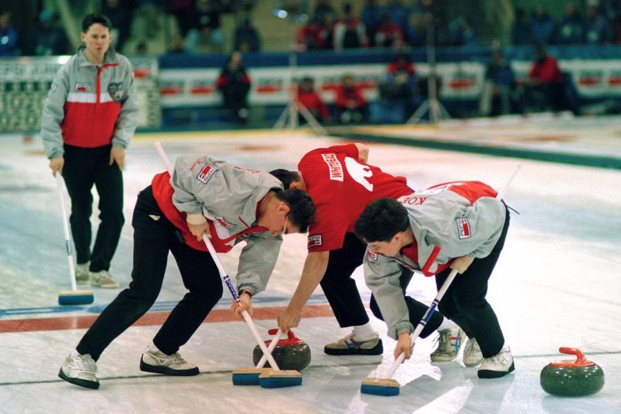 Kevin Koe, left, calls the line as Kevin Whitehead, Mark Whitehead and Jamie Koe lay the brushes during action at the 1994 Pepsi Canadian Junior Curling Championships in Truro, N.S. The rink lost in the final of that year's championships in the most heartbreaking of fashions but they are moving on in NNSL Media's Greatest Of All Time competition. photo courtesy of Sport North 