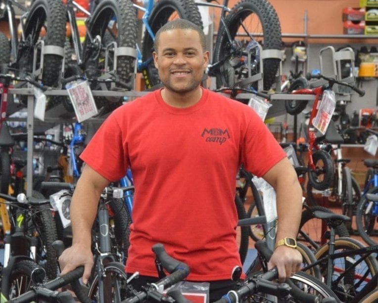 Jordan Crosby, Overlander Sports' store manager, stands among the bicycles on Tuesday afternoon. The store re-opened for business on April 27 after being closed for more than a month due to the Covid-19 pandemic. James McCarthy/NNSL photo