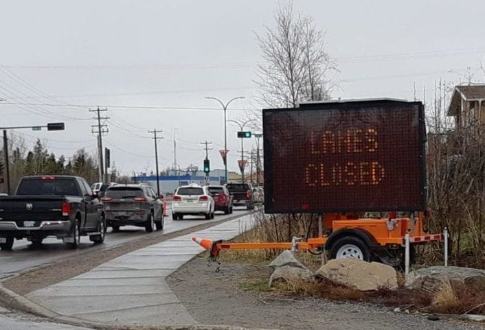 A sign informing indicating lanes are closed ahead greets motorists at the intersection of Old AIrport Rd. and Norseman Dr. on Monday. Construction season is officially underway in Yellowknife and the southbound lanes of Old Airport Rd. between Range Lake Rd. and Byrne Rd. are closed for paving work. James McCarthy/NNSL photo