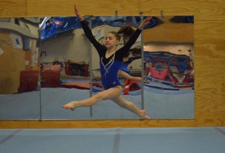 Megan Rogers flies through the air as she performs her floor routine during action in the 2019 NWT Gymnastics Championships at the Yellowknife Gymnastics Club. Rogers and her fellow competitive gymnasts will be the first ones to return to action thanks to the gymnastics club receiving a Phase 2 exemption from the Office of the Chief Public Health Officer this past Wednesday. ºÚÁϳԹÏÍø file photo