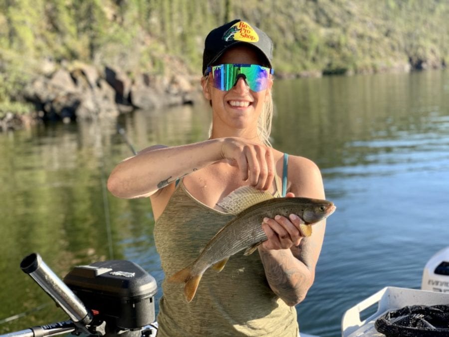 Francesca Bechard holds a grayling she caught during a fishing trip in the summer with Yellowknife Sportfishing Adventures. photo courtesy of Yellowknife Sportfishing Adventures