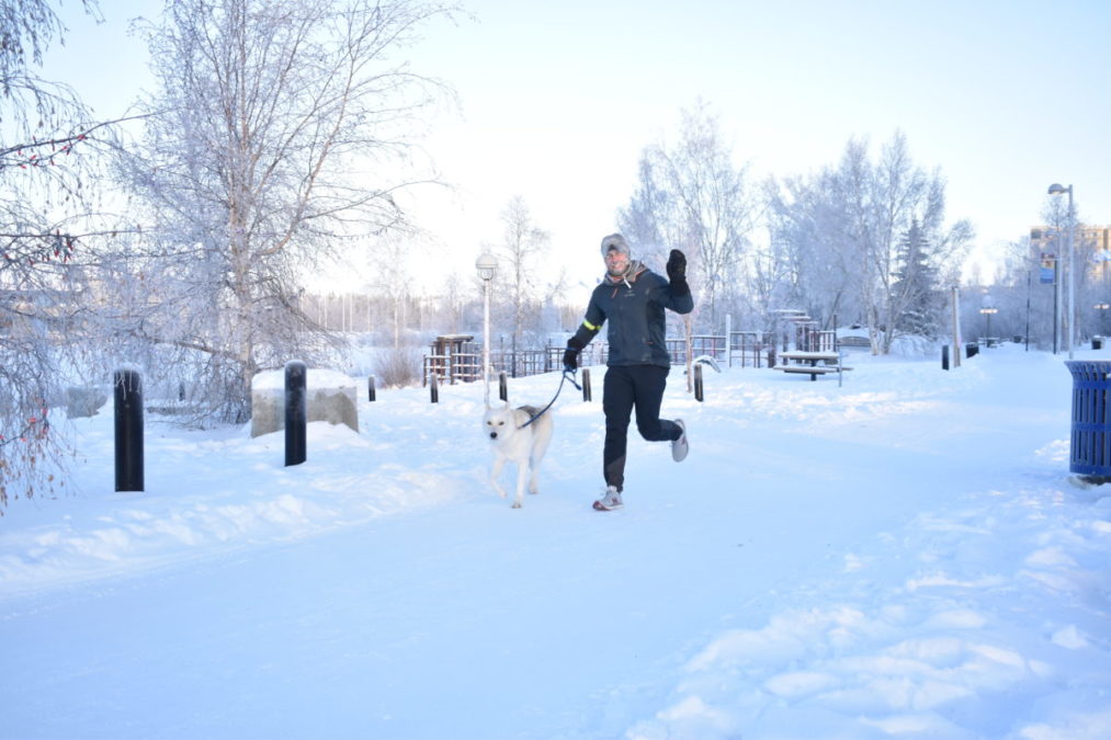 Dave de Lugt and his husky Sam run through Somba K'e Park during their 11 km run on Wednesday when it was -38 C. Blair McBride/NNSL photo