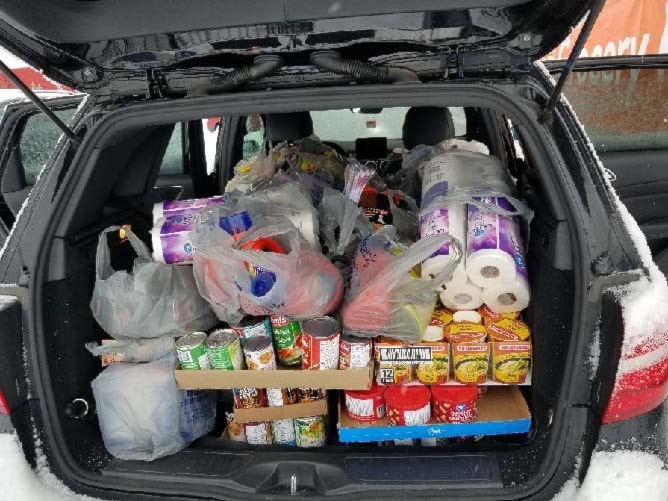 Adopt a village - back SUV w supplies