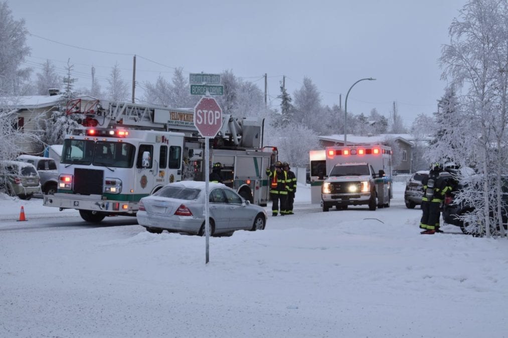 Members of the Yellowknife Fire Department and municipal enforcement officers attended to a vehicle that caught fire on Borden Drive on Tuesday afternoon. Blair McBride/NNSL photo