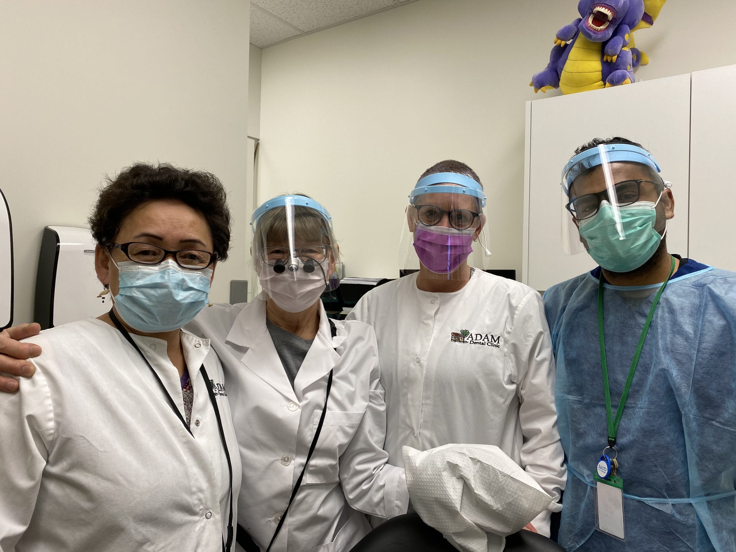 Receptionist Clara Kelly, left, takes a break between dental appointments in Norman Wells on Jan. 21 along with Dr. Pirjo Friedman and dental assistants Carol Edgar and Kaushik Varadha. photo courtesy of Pirjo Friedman