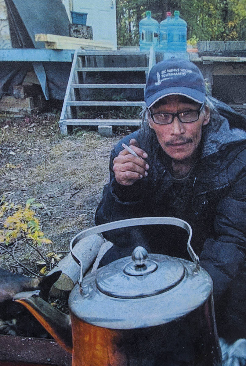 Tony Klengenberg enjoys a cigarette over some tea in a photo distributed throughout the town. Friend and family described him as a caring man who always was there for his friends and family. photo courtesy of Jeffrey Amos and Ruth Wright.