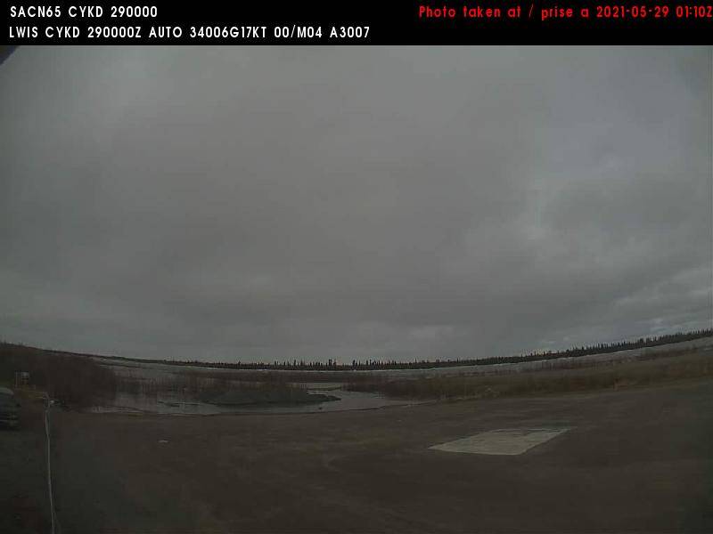 A webcam shot taken from Freddie Carmichael Airport in Aklavik May 28 shortly after 6 p.m. shows water approaching the tarmack as the hamlet flies vulnerable persons and Elders to Inuvik as a precaution. Officials in Aklavik are on 24-hour flood watch over the weekend. photo courtesy of NavCanada