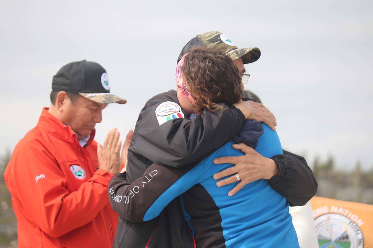  National Chief Norman Yakeleya and City of Yellowknife Mayor Rebecca Alty embrace after her speaking engagement where she expressed her sadness on the Kamloops development and the negative history of Canadian treatment of Indigenous peoples. Simon Whitehouse/NNSL photo 