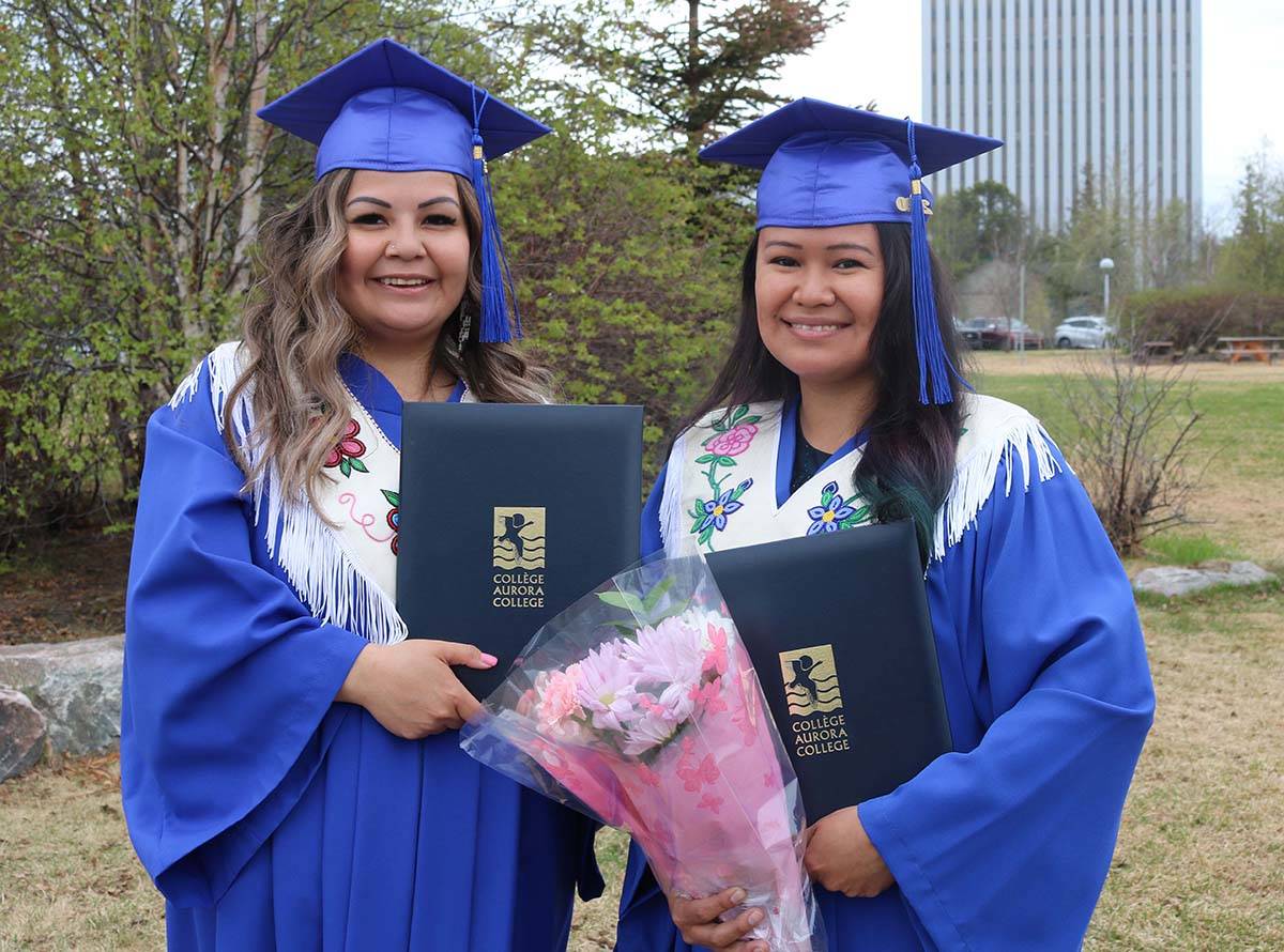 Samantha Bishop of Whati and Vanessa Sanguez of Jean Marie River both celebrate their early learning and child care diplomas. Simon Whitehouse/窪蹋勛圖厙 photo