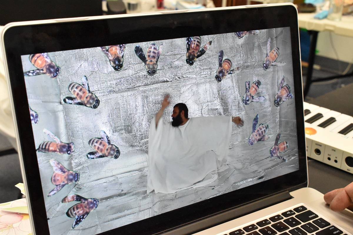 An animation scene shows Martin Rehaks character being tormented by a swarm of bees. Blair McBride/窪蹋勛圖厙 photo
