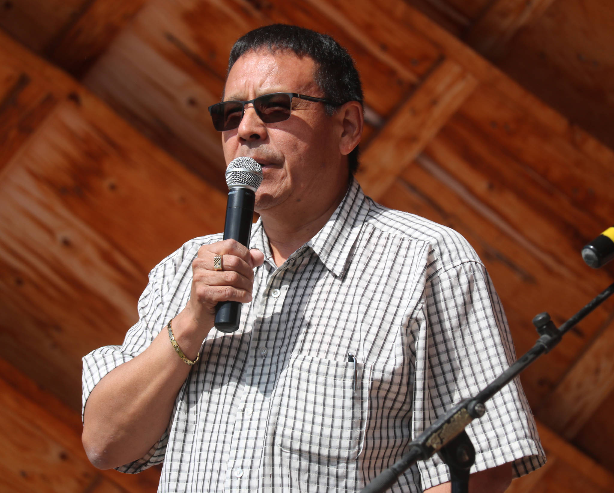 Chief Ernest Betsina (Ndilo) greets the crowd following the fire feeding ceremony. Simon Whitehouse/ϳԹ photo