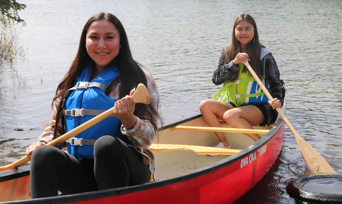 Joslynn Auger, left, and Ariana Sundberg hit the Yellowknife River for a paddle during National Indigenous Peoples Day festivities. Simon Whitehouse/ϳԹ photo