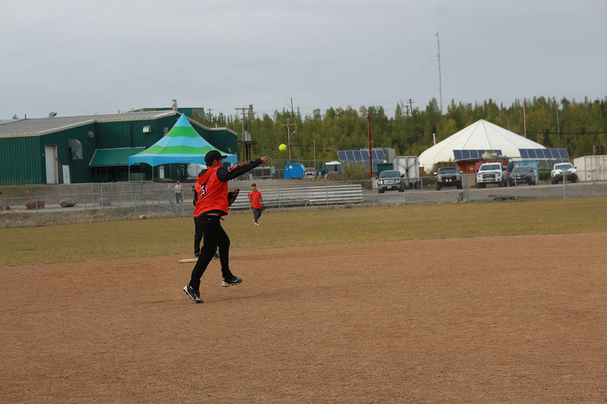 Tony Stefure throws a retrieved ball to first base before the runner reaches it. Eric Bowling/NNSL photo