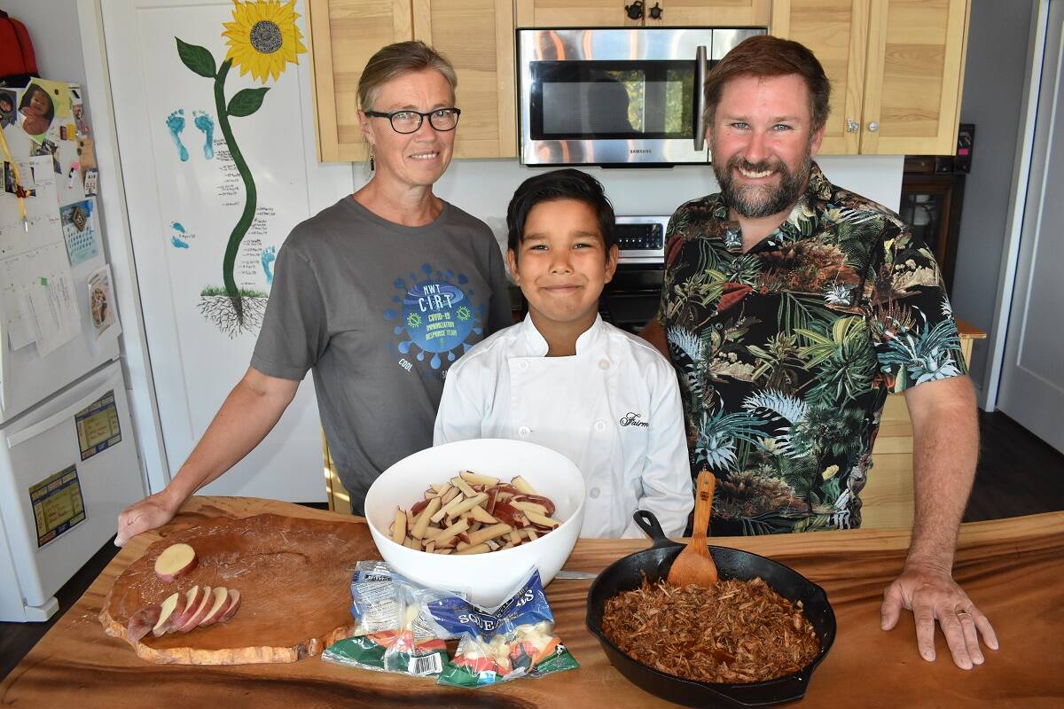 Anna Bergen, left, Drew Sinclair and Trevor Sinclair sometimes cook meals together and sometimes Drew makes them all by himself. Blair McBride/NNSL photo