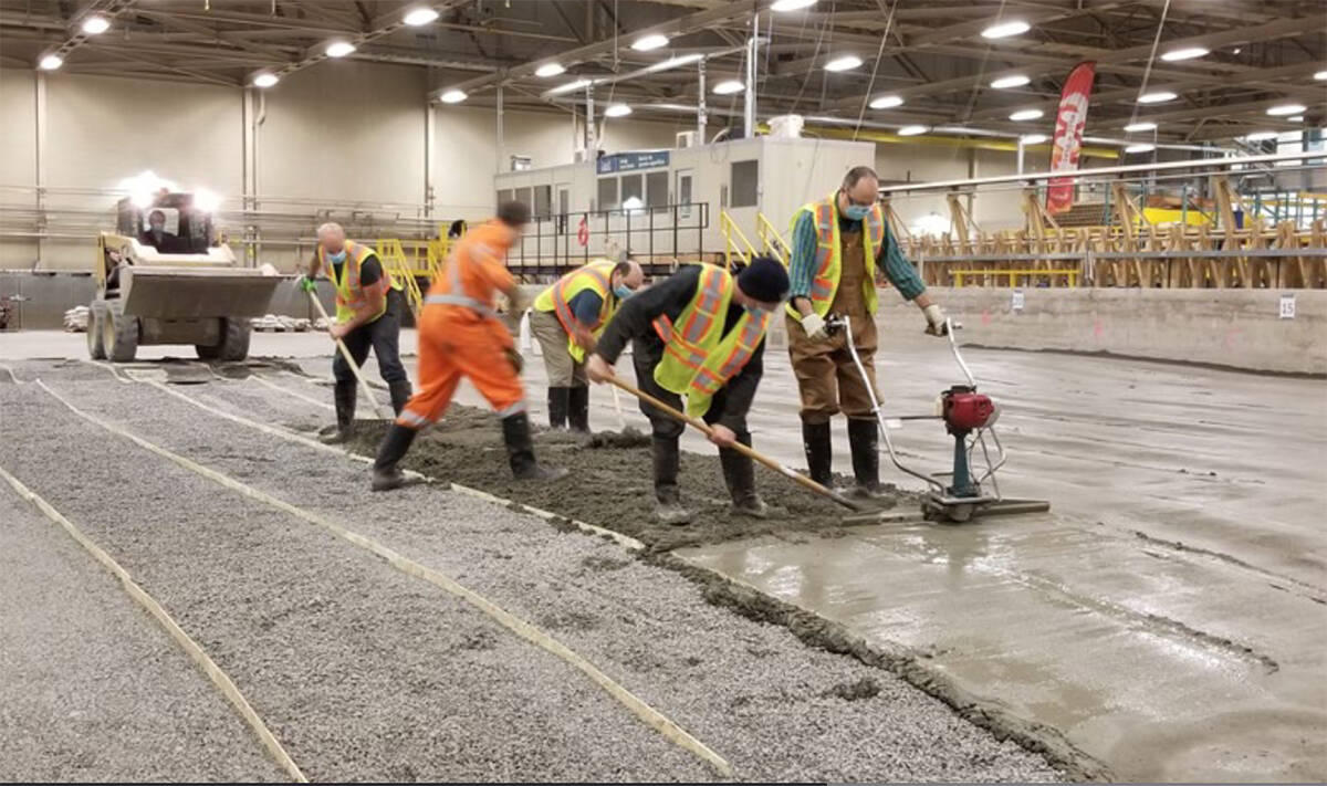 Crews work on a test-model of one of the three seawalls proposed for the coastline along Tuktoyaktuk. Planners ultimately went with the third option, using boulders from quarries to stave off erosion. Screenshot courtesy of Baird Engineering