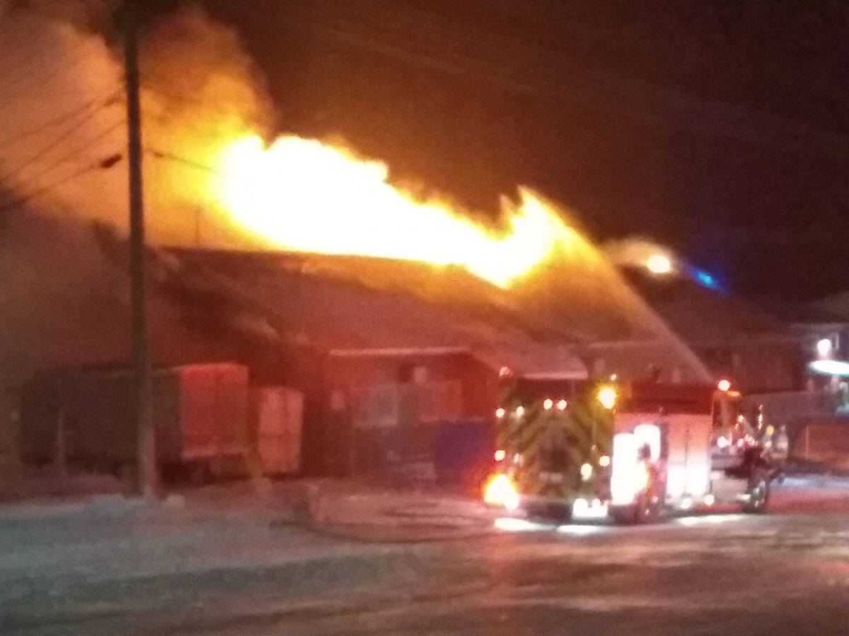 Inuvik Warming Shelter on fire Nov. 27. Firefighters were on scene battling the blaze as of 6:30 p.m. Eric Bowling/NNSL photo