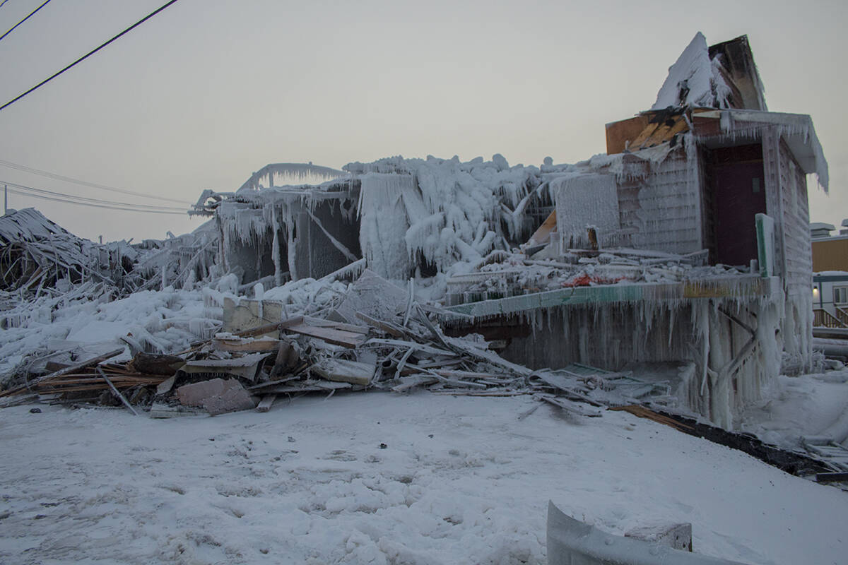 Timber and ice. Inuvik Warming Centre burned down Nov. 27 in a massive fire that knocked out power for much of the community for up to an hour. Eric Bowling/NNSL photo