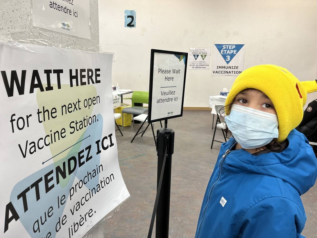 Osler Letts, 8, was one of the three Letts siblings waiting in line to receive his vaccination. Photo courtesy of Daron Letts