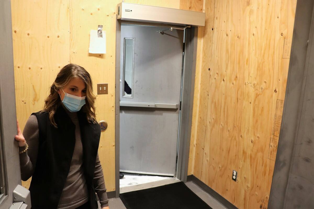 Jenna Scarfe, director for mental health and community wellness at NTHSSA, displaying the entrance way for shelter clients. Ethan Butterfield/NNSL photo