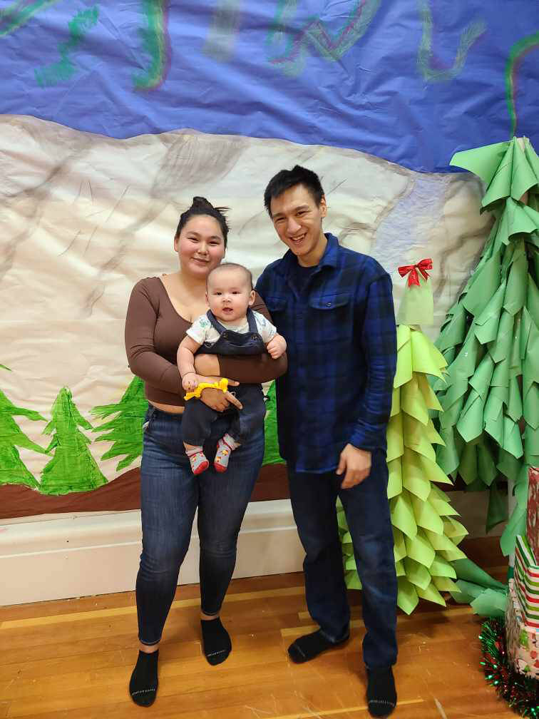Our Youth of the Week this week is Philip Man Elanik, seen here with his wife and child Petra and Philp Jr. Dont let them fool you, Philip only recently graduated from Moose Kerr School in Aklavik and is already giving back to the community. Because Covid-19 restrictions prevented the school from having its annual Christmas concert, Philip volunteered to teach the students and staff a jigging routine for the holidays.