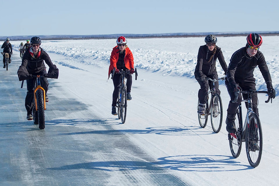 27566251_web1_210422-INU-IceRoadCyclists-1_1