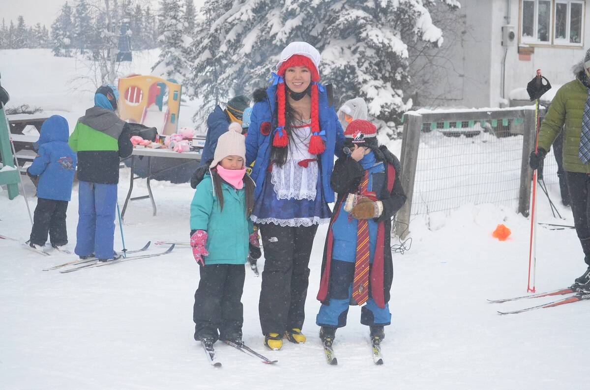Organizer Oyuka Bernabe, centre, came as Raggedy Ann, along with her children, Elizabeth Bernabe, left, and Benjamin Bernabe. James McCarthy/ϳԹ photo