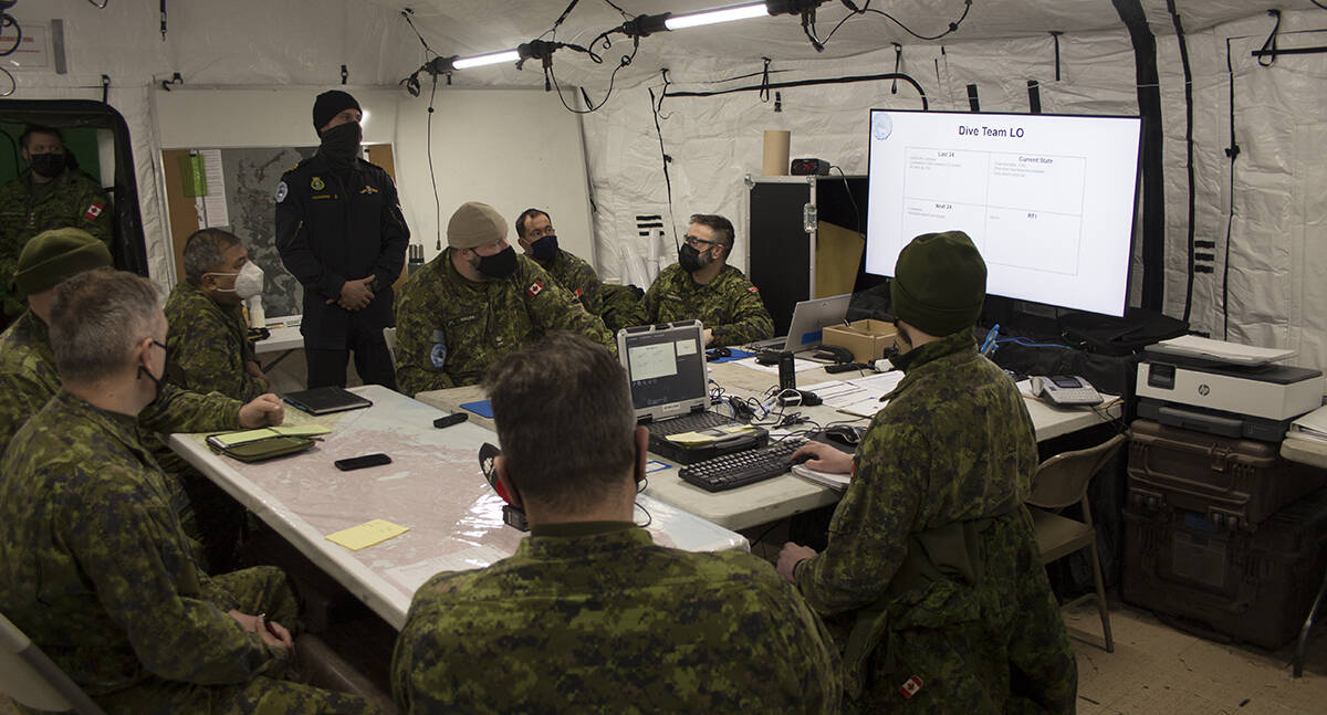 Command staff of Operation Nanook-Nunalivut get an update on the daySA国际影视传媒檚 operations during the CommanderSA国际影视传媒檚 Update Brief in Tuktoyaktuk Feb. 21. Eric Bowling/NNSL photo