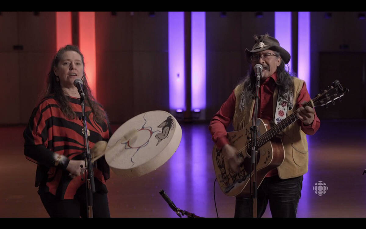 Yukon musicians and past Arctic Inspiration Prize winners Dena Zagi, consisting of ennifer Fr枚hling and Dennis Shorty, perform during the ceremony. Screenshot courtesy of Arctic Inspiration Prize