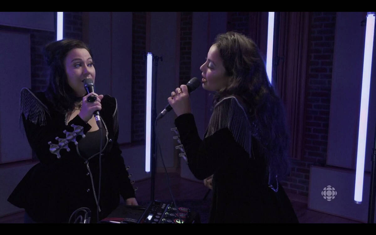 Inuit throat singers Piqsiq, consisting of Kayley Inuksuk Mackay and Tiffany Kuliktana Ayalik, sing a song during the ceremonies. Screenshot courtesy of Arctic Inspiration Prize