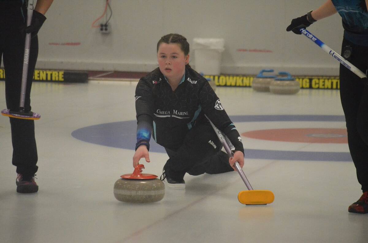 Sydney Galusha locks eyes on the broom as she delivers a thirdÂ’s stone. James McCarthy/ºÚÁϳԹÏÍø photo