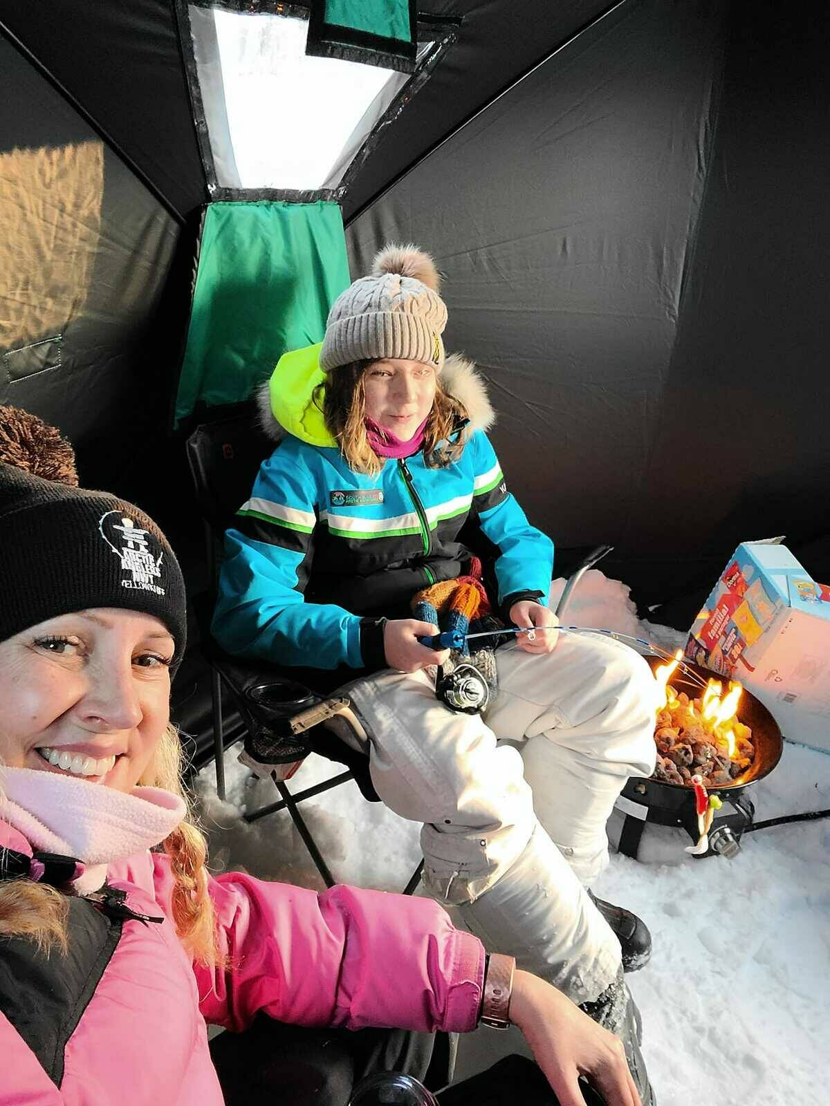 Bethan Williams and River Simpson out at the Fifth Annual Fishing Derby. River would end up catching the winning trout for the team. Photo courtesy of Bethan Williams