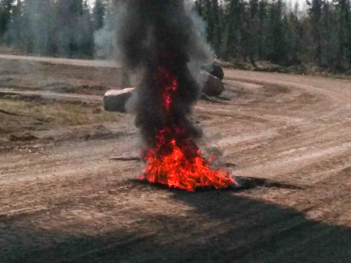 A tire and hubcap were found ablaze and unattended at the Inuvik Cemetery June 16. An investigation is underway. Eric Bowling/NNSL photo
