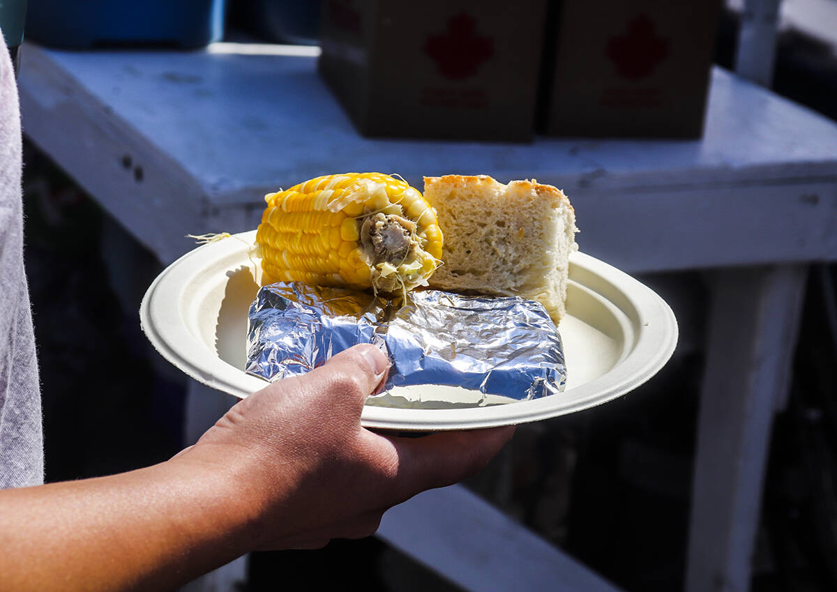 This yearÂ’s meal included Great Slave whitefish, corn, beans and bannock. Ian Down/NNSL photo