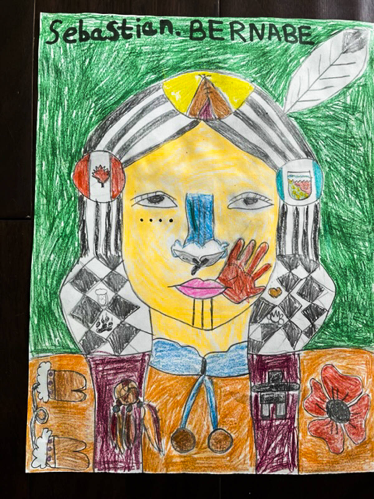 Sebastian聮s drawing is a portrait of an Indigenous woman with several icons around her head, including the flags of Canada and the Northwest Territories. Photo courtesy of Oyuka Bernabe