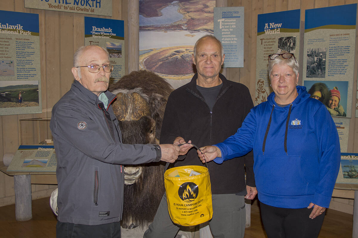 Our Visitors of the Week are Claude Lavoie and France Broullette of Montreal, seen here with Mayor Clarence Wood. On a road trip through Yukon, the pair had initially planned to stop at Tombstone National Park, but because the scenery just kept getting nicer the farther they drove, they just kept following the Dempster highway all the way to Inuvik. Now in love with the landscape, they聮re planning to go the rest of the way to Tuktoyaktuk. Eric Bowling/NNSL photo