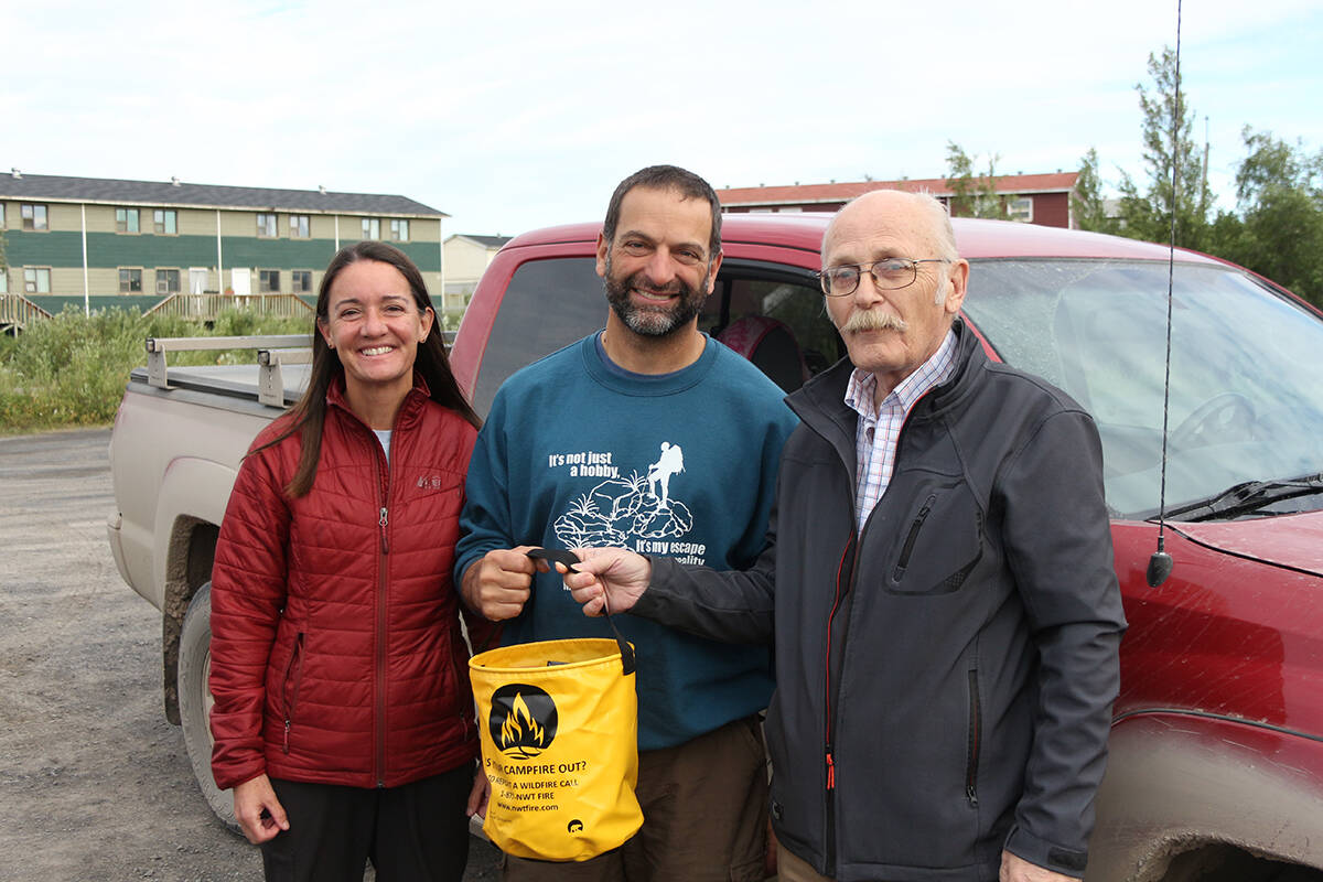 Our Visitors of the Week are Tammi and Brian Difranco, seen here with Town of Inuvik Mayor Clarence Wood. The pair drove all the way from Welleseley Island, New York, which is right on the border with Ontario. They聮ve been roadtripping all over the north, first hitting Alaska and then making their way to Tuktoyaktuk. They said they聮re just mezmerized by how much and quickly the scenery changes as you go. Eric Bowling/NNSL photo
