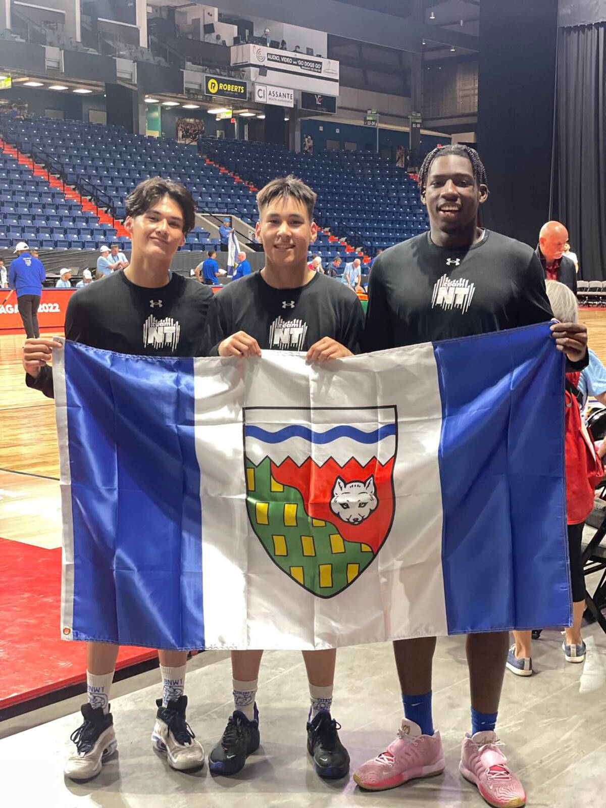 Our Youths of the Week are Justin Stewart, Dwayne Raddi and AJ Abba, seen here holding the NWT Flag at Niagra Falls, Ont. at the Canada Summer Games. The trio were selected to represent the north on Team NWT and put on a show for fans who followed them down, having strong games against Team Yukon and P.E.I. Great work guys, you聮ve done Inuvik proud. Photo courtesy of Stephanie Parkes