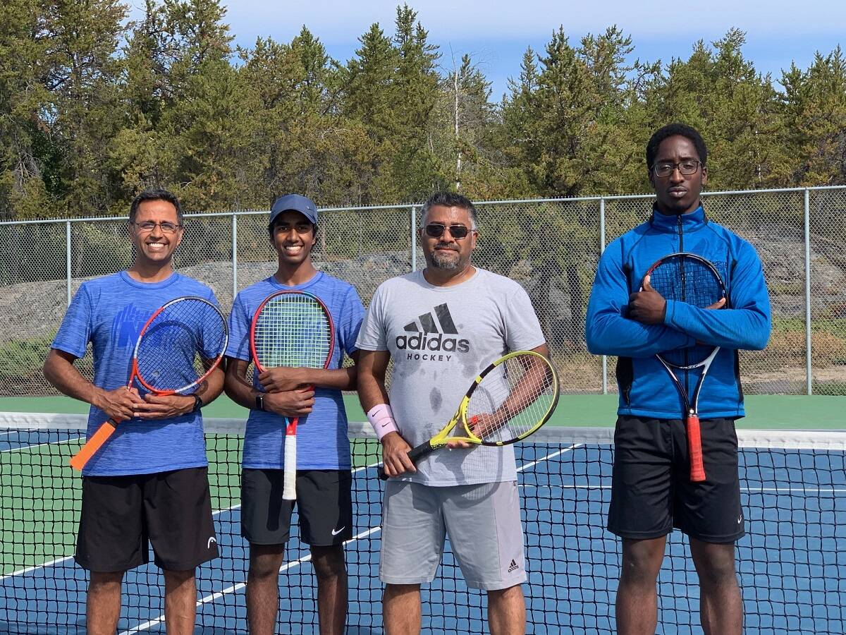 The father-son duo of Nittin Gohil, left, and Nikhilesh Gohil beat the pairing of Shamir Siraj and Obed Duru in the men聮s doubles final of the Yellowknife Tennis Club聮s Doubles Tournament on Aug. 21. Photo courtesy of Slavica Jovic