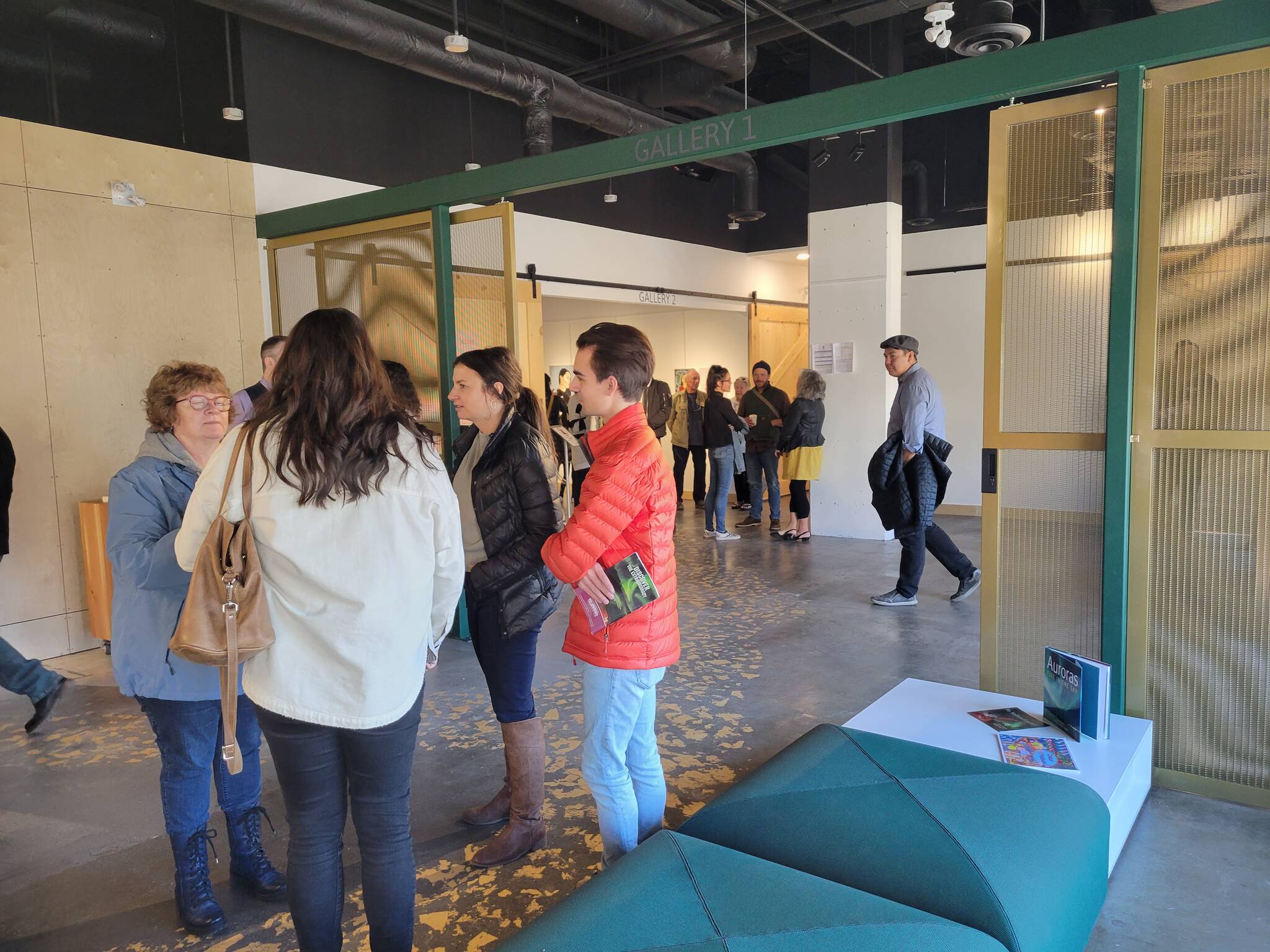 Several residents come out to take a look at the city聮s new visitor centre. Ethan Butterfield/NNSL photo