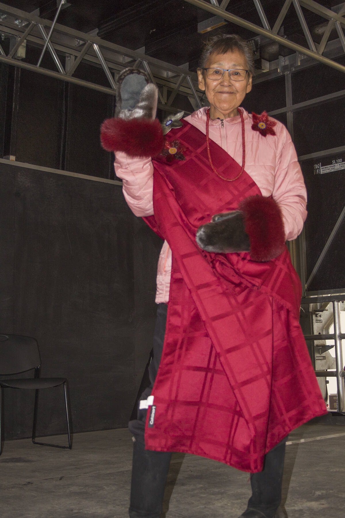 Mary Roland took some convincing to get on stage, but showed off this stunning red cover and mitts when she made the walk. Eric Bowling/NNSL photo