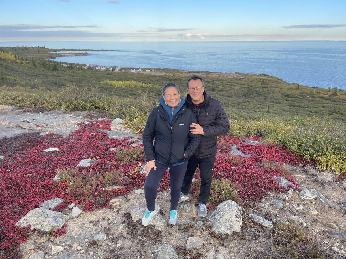 Jean and Roy Erasmus on a hill with the camp in the background. Photo by Jean Erasmus