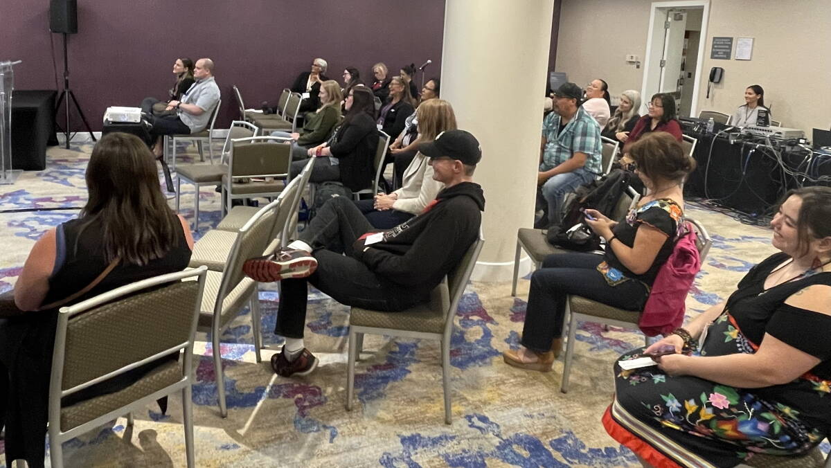 The crowd watches the presentation by Jean and Roy Erasmus at the National Summit on Indigenous Wellness in Toronto. Photo by Cristina Soto