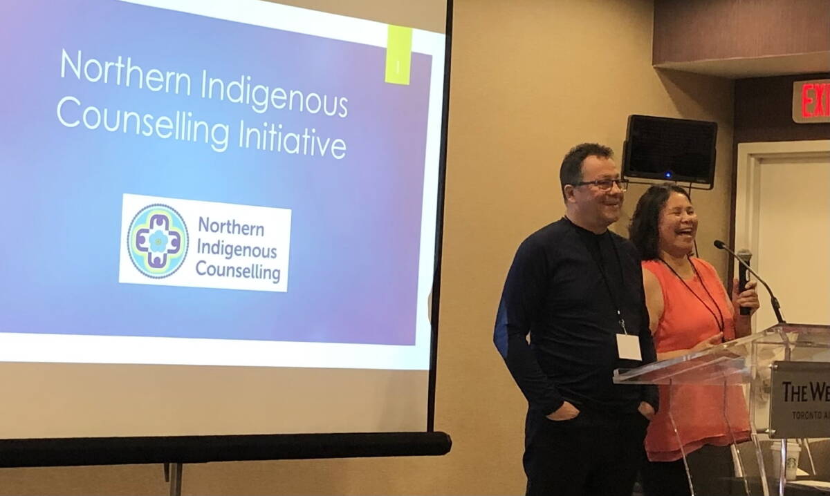 Jean Erasmus and Roy Erasmus make a presentation to the National Summit on Indigenous Wellness in Toronto on Sept. 23. Photo by Cristina Soto
