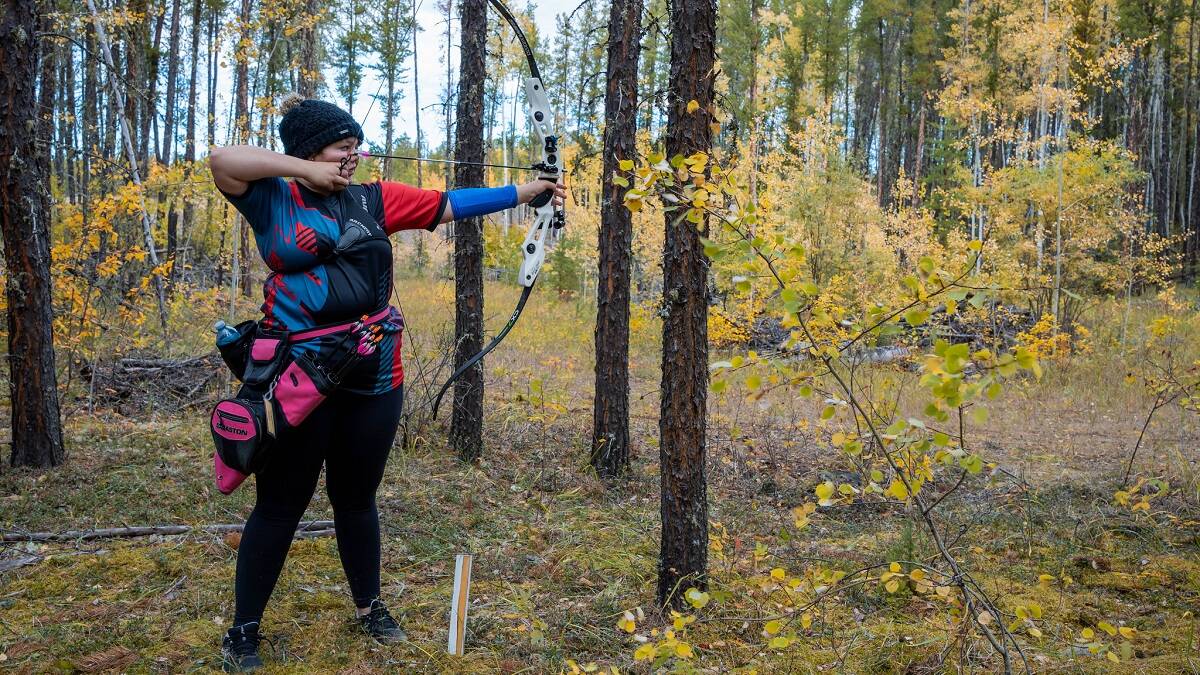 Sophia Elder lines up her shot with a compound bow during the Archery NT Championships in Fort Smith late last month. Emanuel Ramos/Aboriginal Sports Circle of the NWT photo