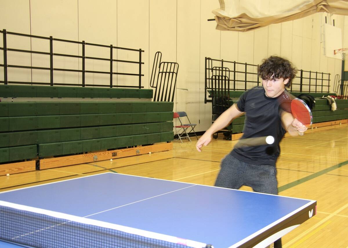 David Dragon returns the ball with lightning speed during Table Tennis North聮s open house at Weledeh gymnasium on Friday. Jill Westerman/黑料吃瓜网 photo