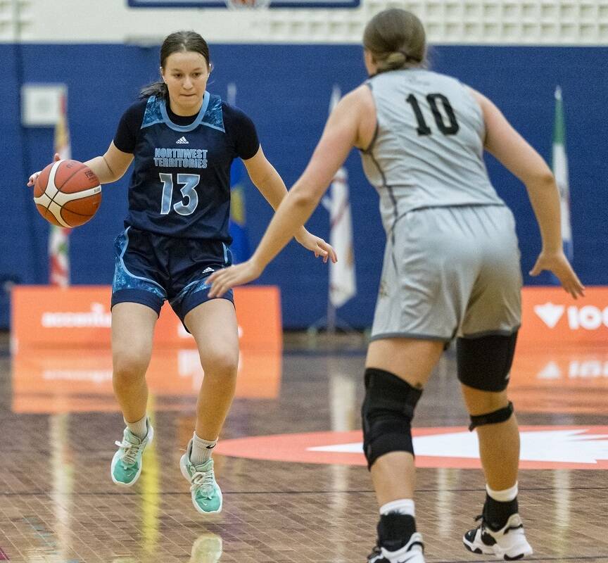 Taya Straker looks for a way to get around a Manitoba defender during girls basketball action at the Canada Summer Games this past August. Straker and Lily Newberry have committed to the womens basketball program at Mount Saint Vincent University in Halifax for 2023. Photo courtesy of Thorsten Gohl