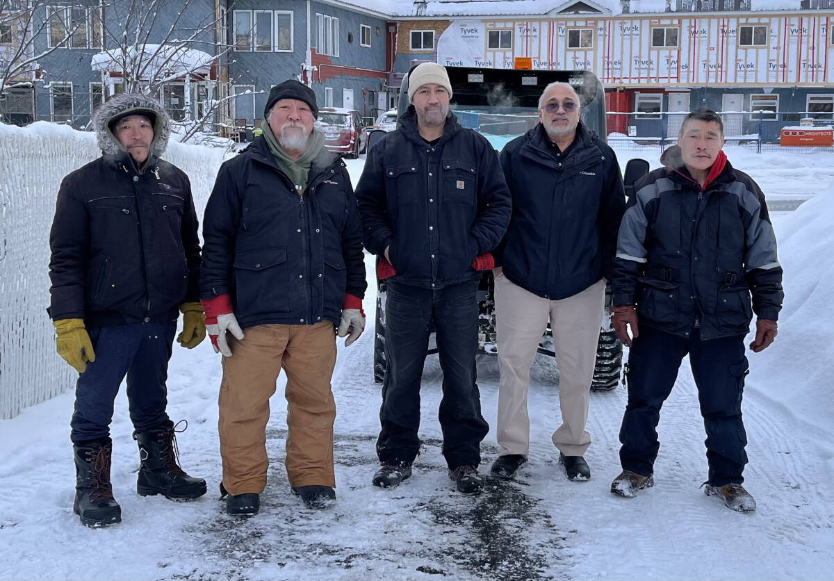 Dr. Hassan Adam, second from right, with his crew of helpers, whose groundskeeping duties include snow removal. Also pictured, from left, Gerry Ohokak, Wallace Taptuna, Jesse Griep and John Keknek. Photo courtesy of Hassan Adam